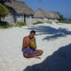 Joel enjoys a refreshing coconut outside our caba&ntilde;a in Tulum.